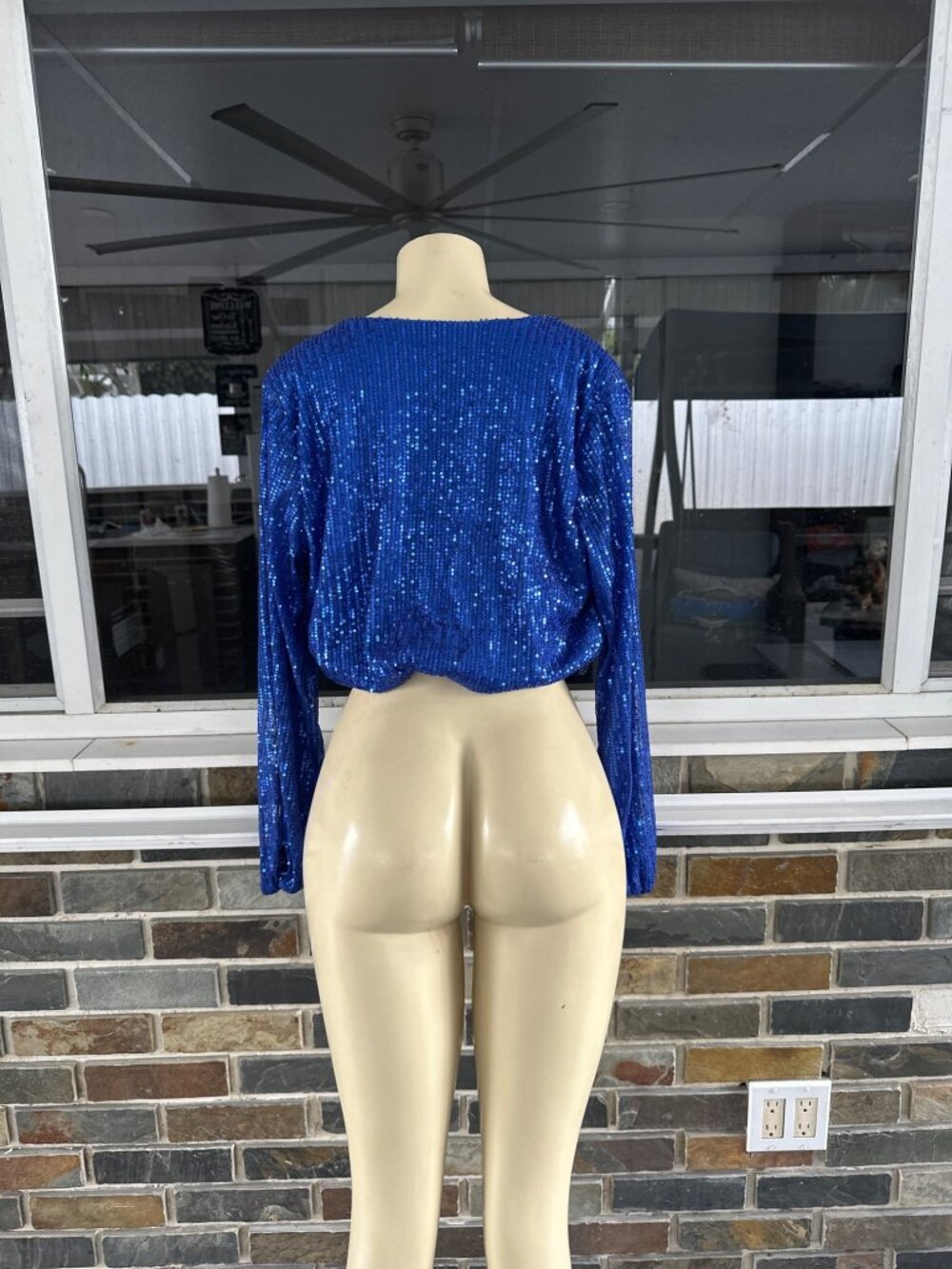 Blusa azul de lentejuelas – Talla S